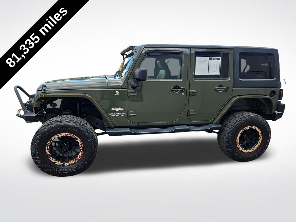 Used 2015 Jeep Wrangler Unlimited Sahara w/ Dual Top Group AWD/4WD image 2