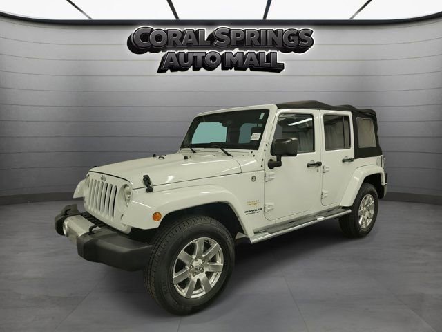 Used 2014 Jeep Wrangler Unlimited Sahara w/ Dual Top Group AWD/4WD image 2
