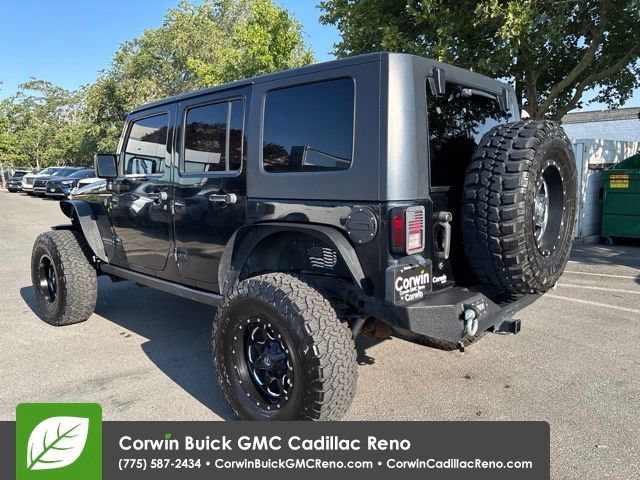 Used 2010 Jeep Wrangler Unlimited Rubicon w/ Dual Top Group AWD/4WD image 4