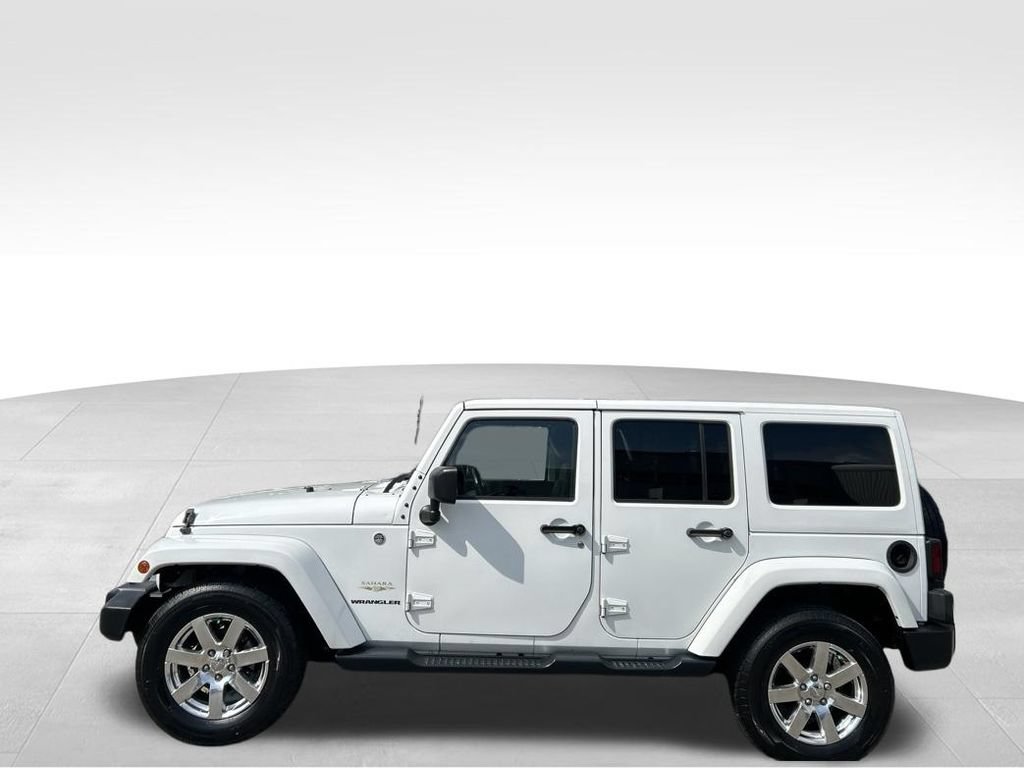 Used 2015 Jeep Wrangler Unlimited Sahara w/ Max Tow Package AWD/4WD video 2
