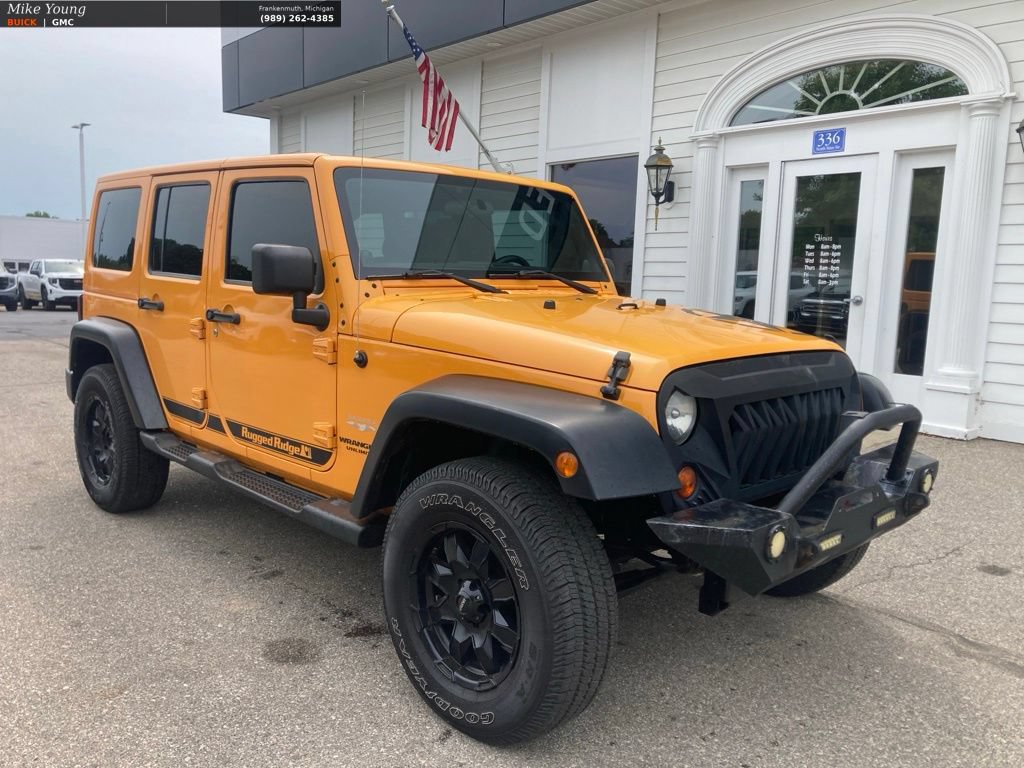 Used 2012 Jeep Wrangler Unlimited Sahara w/ Dual Top Group AWD/4WD image 3