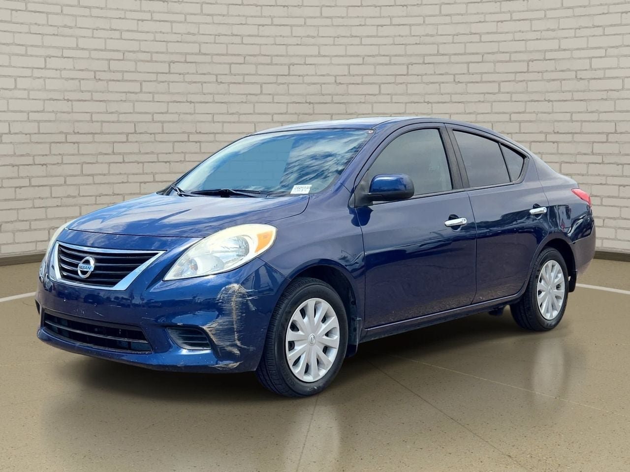 Used 2013 Nissan Versa SV FWD video 1