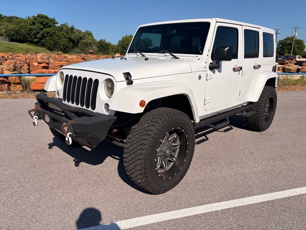 Used 2014 Jeep Wrangler Unlimited Sahara w/ Connectivity Group AWD/4WD image 1