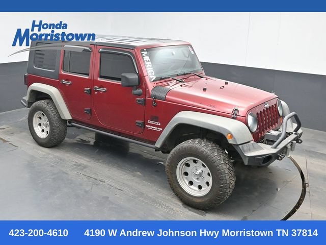 Used 2012 Jeep Wrangler Unlimited Sport w/ Max Tow Pkg AWD/4WD image 1