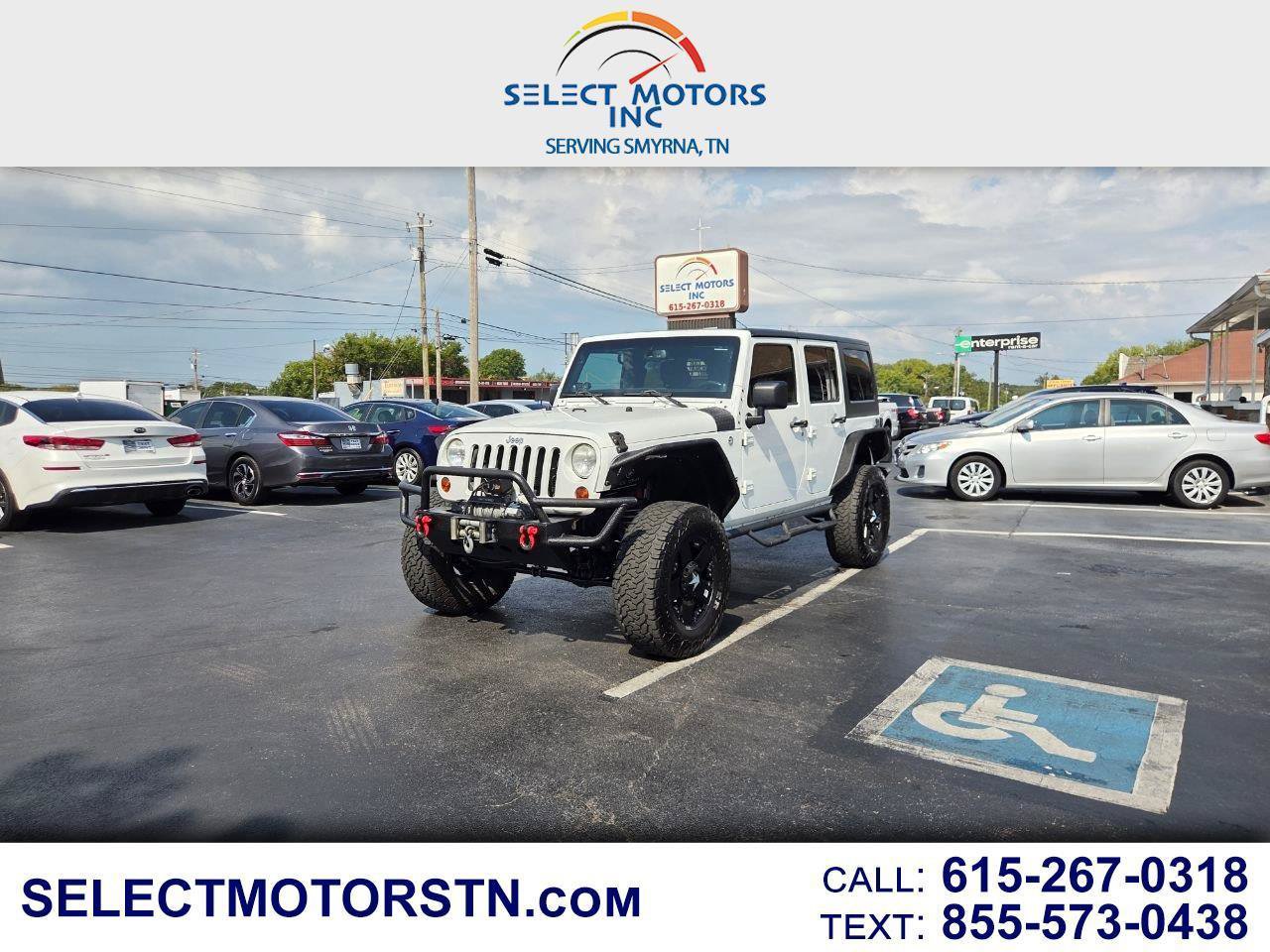 Used 2013 Jeep Wrangler Unlimited Sport AWD/4WD image 1