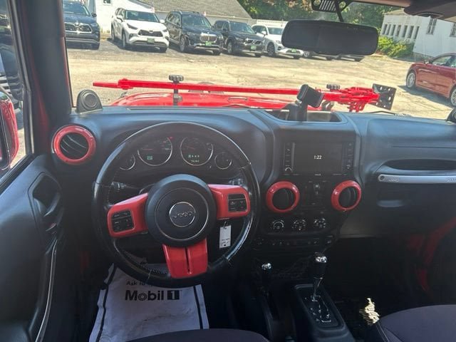 Used 2014 Jeep Wrangler Unlimited Sahara w/ Mopar Chrome Edition Group AWD/4WD image 16