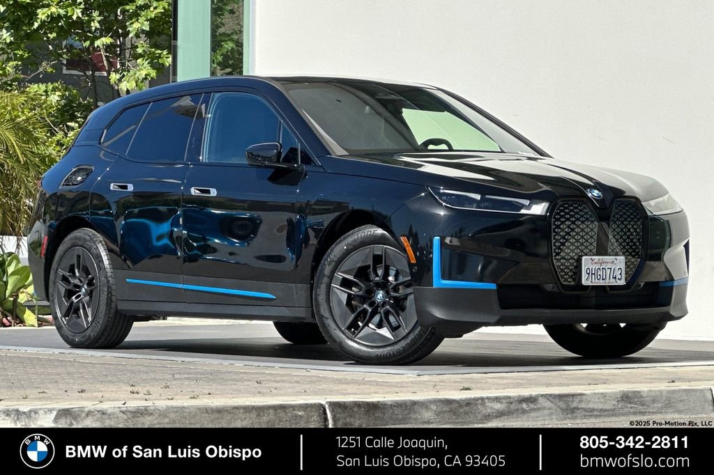 Used 2023 BMW iX xDrive50 w/ BMW I Signature Blue Package AWD/4WD image 1