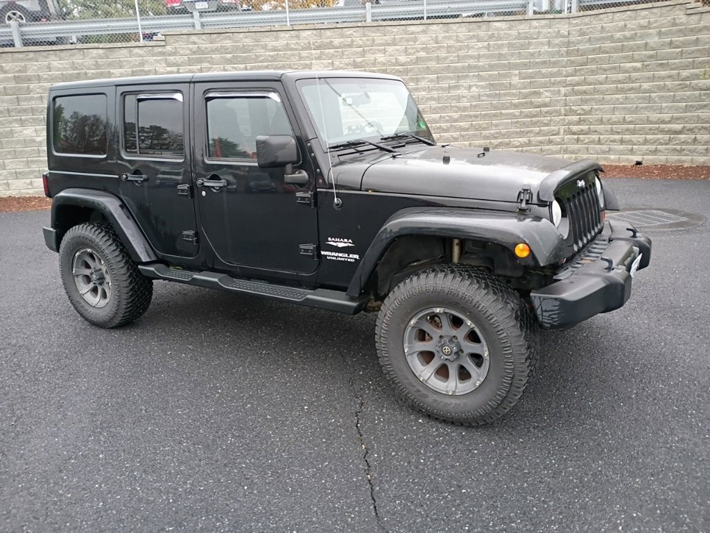 Used 2012 Jeep Wrangler Unlimited Sahara w/ Dual Top Group