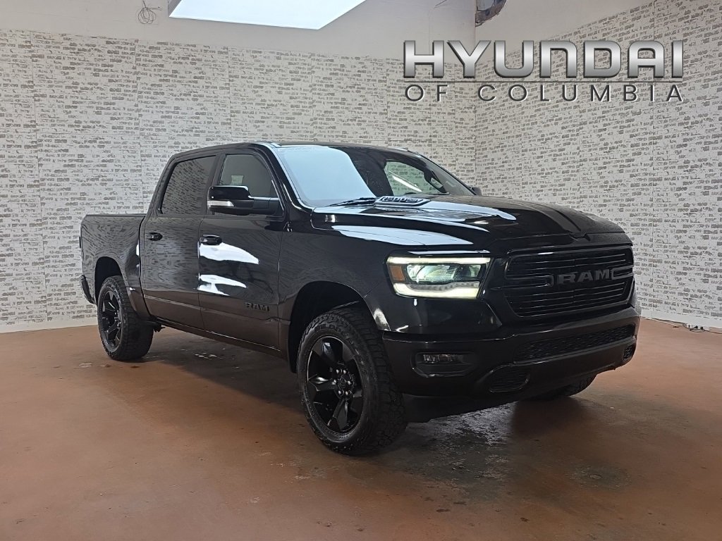 Used 2019 RAM 1500 Sport w/ Black Appearance Package image 1