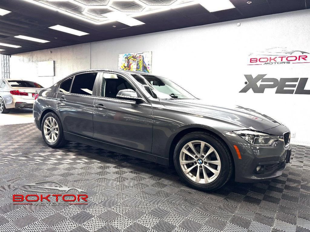 Used 2018 BMW 320i xDrive Sedan AWD/4WD image 1