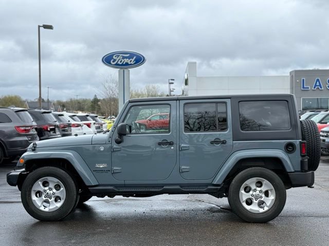 Used 2015 Jeep Wrangler Unlimited Sahara w/ Dual Top Group AWD/4WD image 39