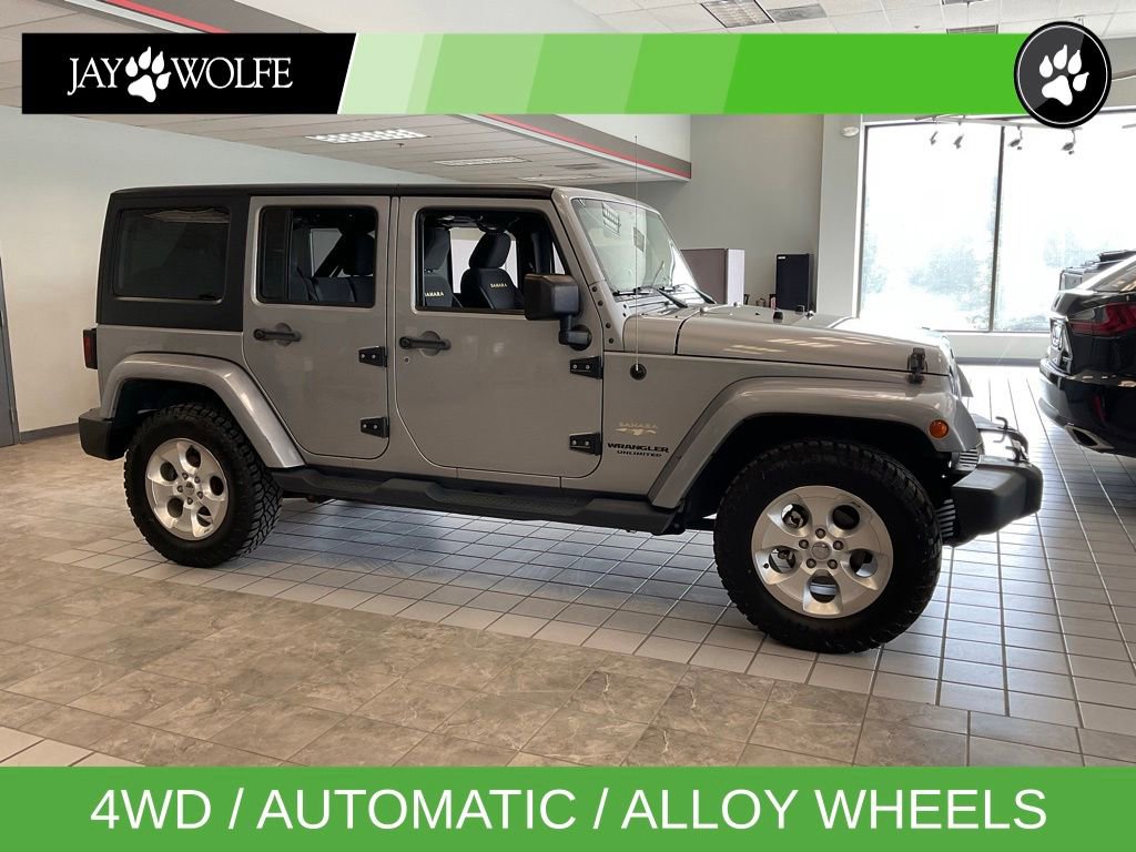 Used 2015 Jeep Wrangler Unlimited Sahara w/ Max Tow Package AWD/4WD image 1