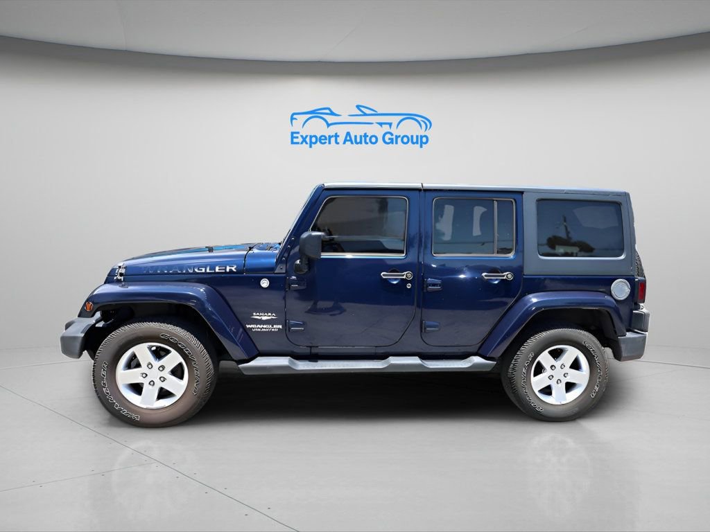 Used 2013 Jeep Wrangler Unlimited Sahara w/ Connectivity Group AWD/4WD image 2