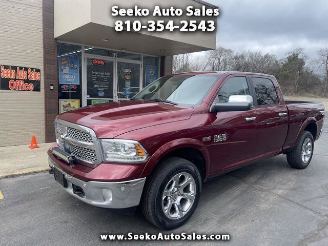 Used 2018 RAM 1500 Laramie AWD/4WD image 1