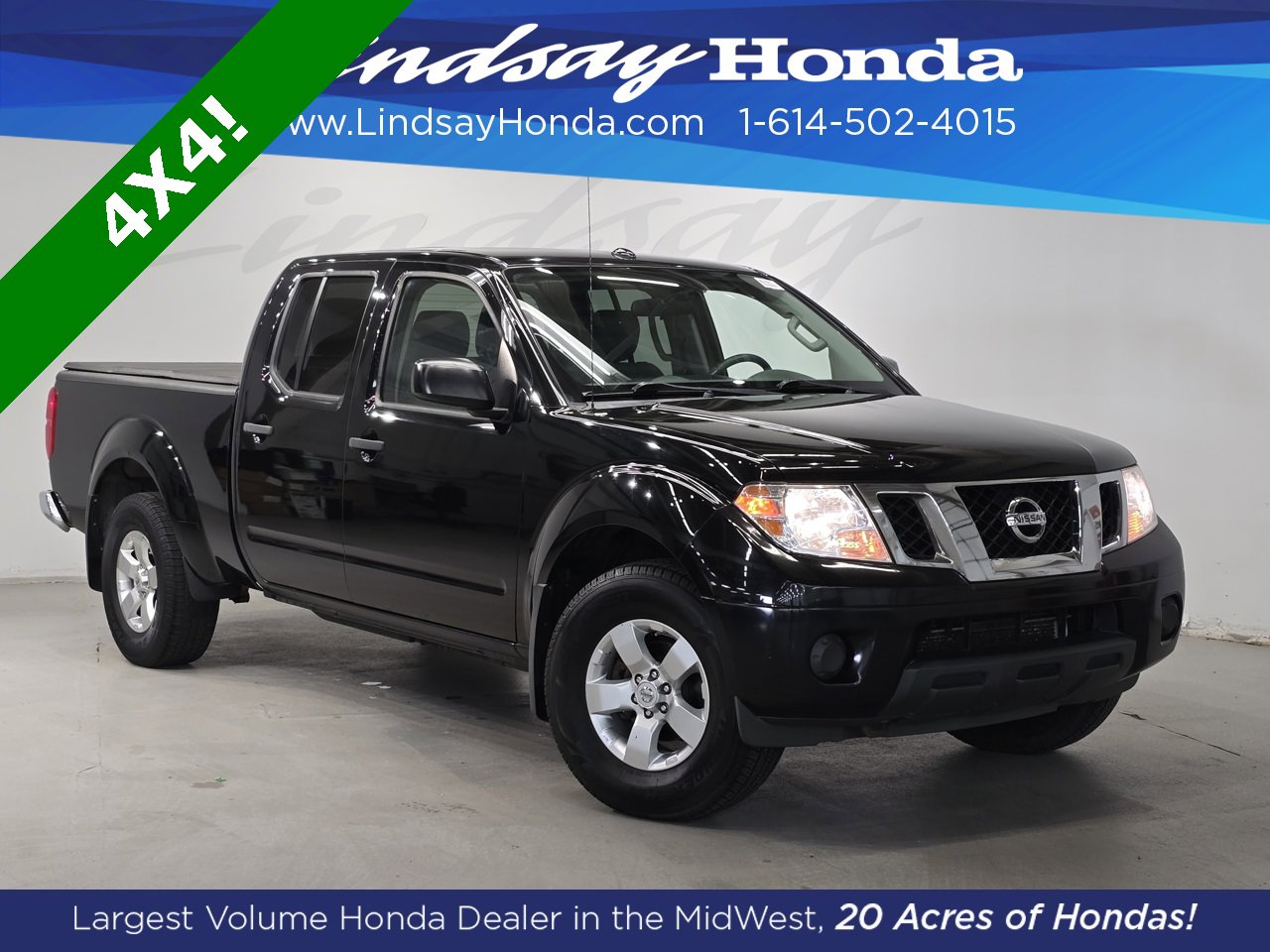 Used 2013 Nissan Frontier SV image 1