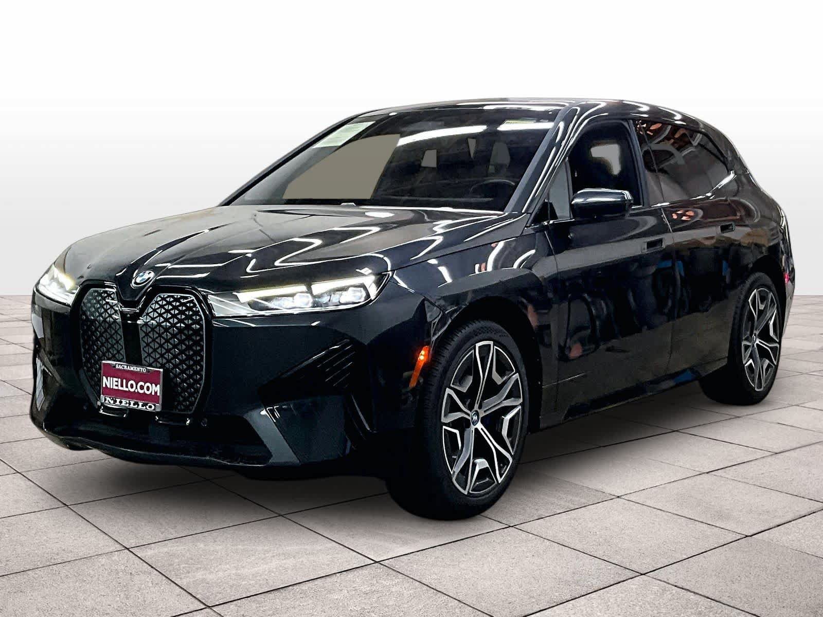 Used 2024 BMW iX xDrive50 w/ Sport Package AWD/4WD image 1