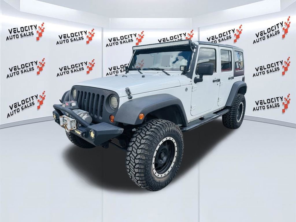 Used 2013 Jeep Wrangler Unlimited Sahara w/ Connectivity Group AWD/4WD image 7