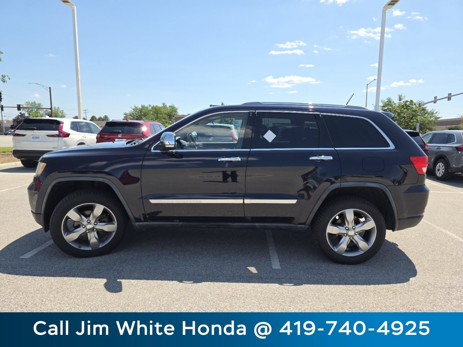 Used 2011 Jeep Grand Cherokee Overland w/ Mopar Chrome Edition Group AWD/4WD image 12