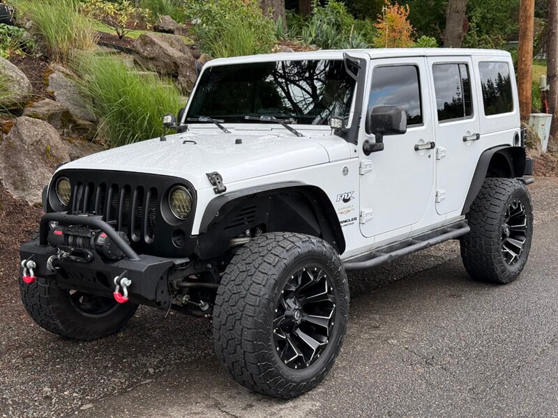 Used 2015 Jeep Wrangler Unlimited Sahara w/ Connectivity Group AWD/4WD image 1