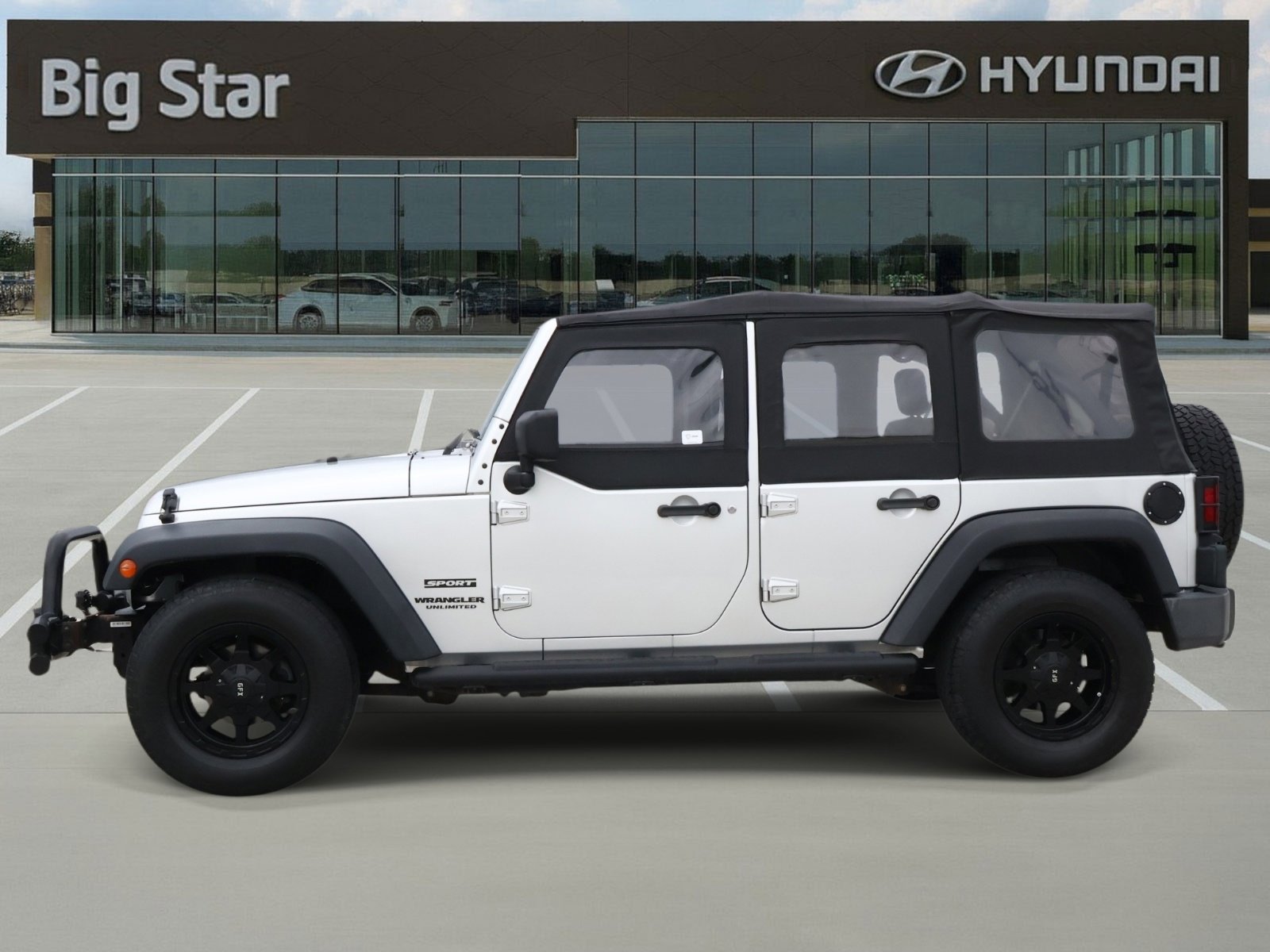 Used 2010 Jeep Wrangler Unlimited Sport w/ Black Appearance Group RWD image 2