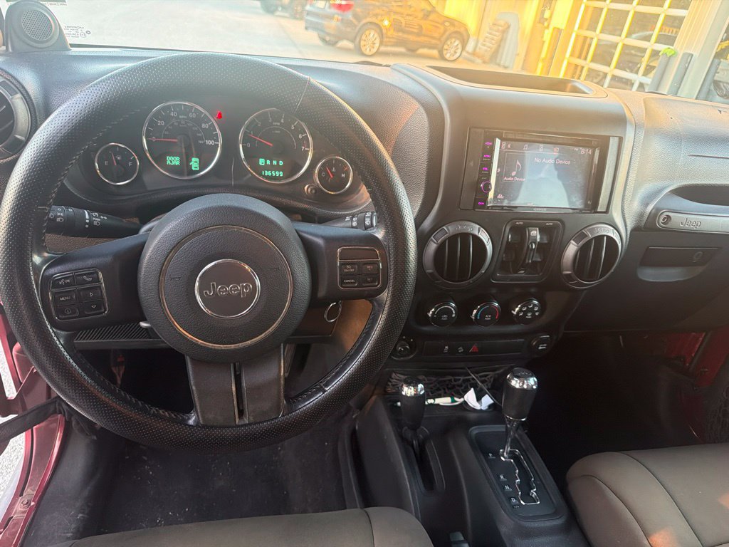 Used 2012 Jeep Wrangler Unlimited Sport AWD/4WD image 9