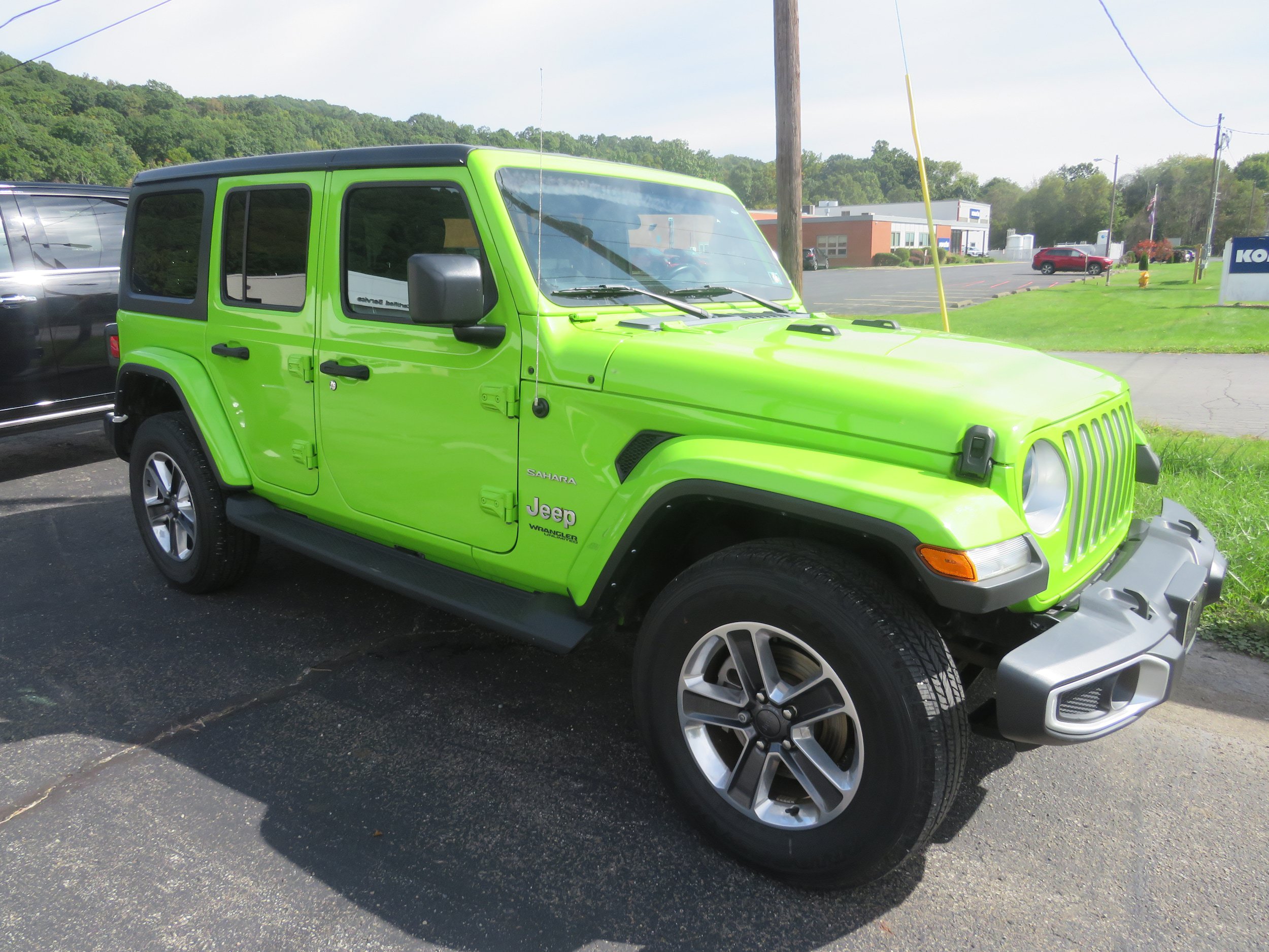 Used 2021 Jeep Wrangler Unlimited Sahara AWD/4WD image 1