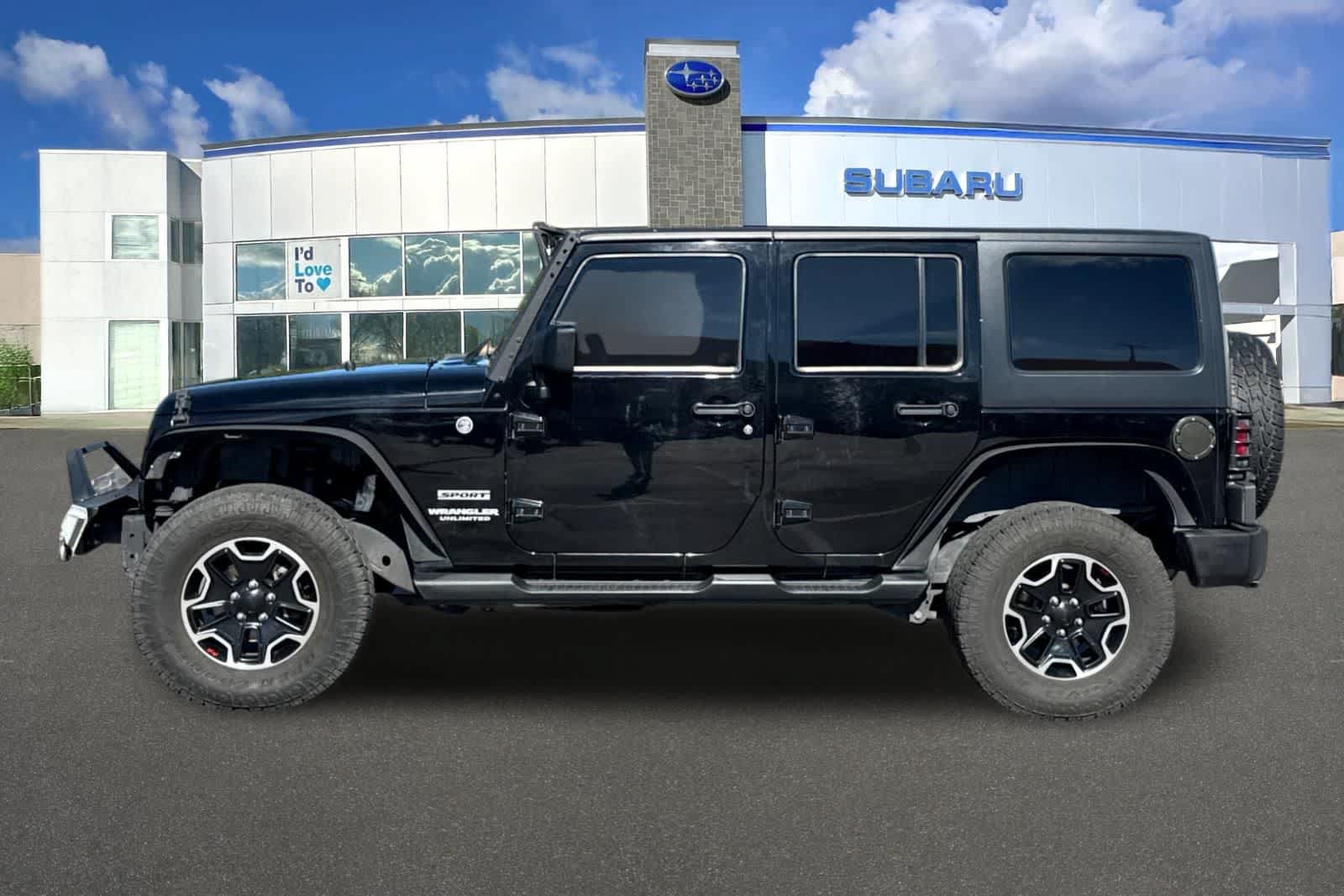 Used 2013 Jeep Wrangler Unlimited Sport AWD/4WD image 9