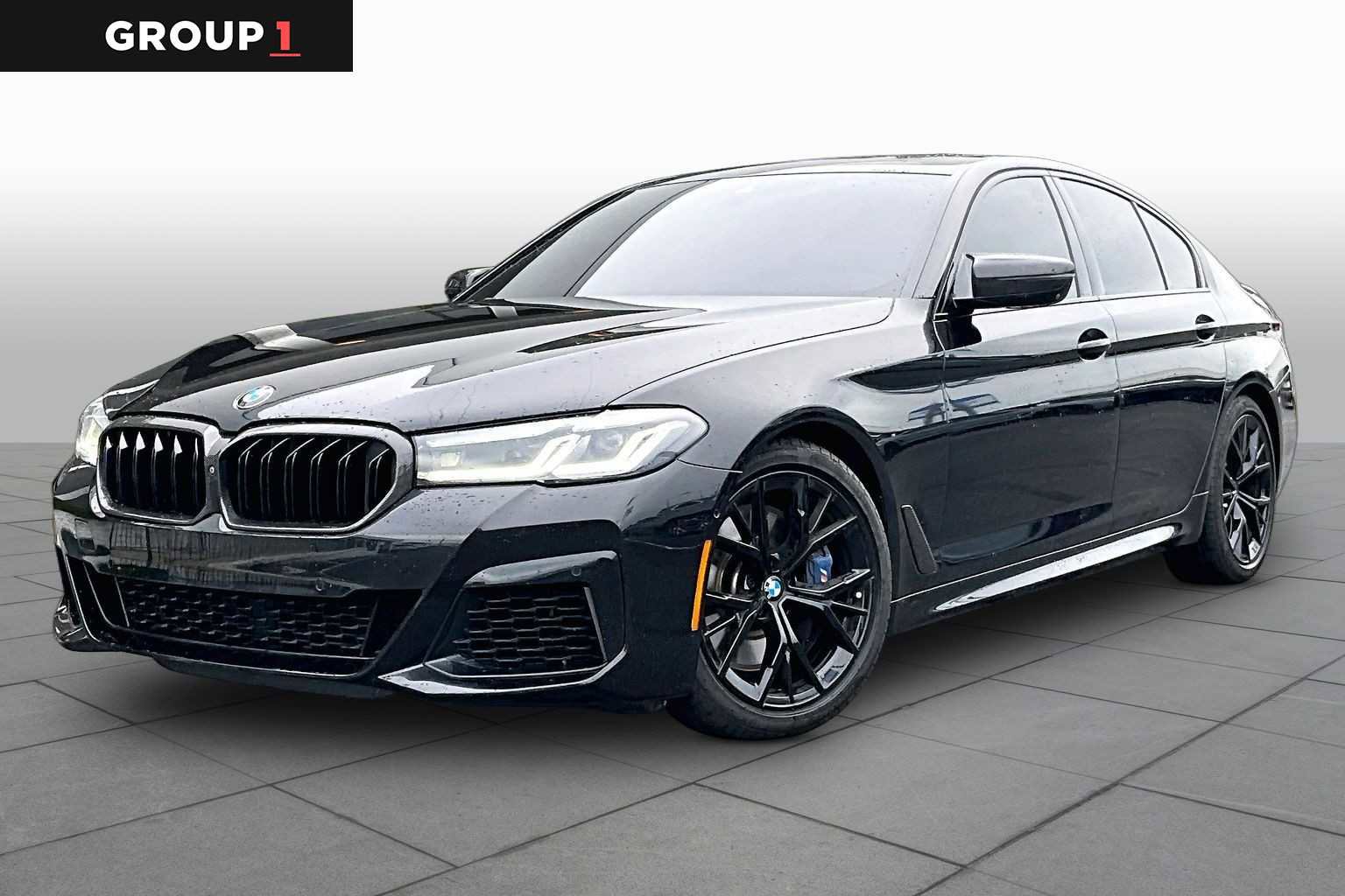 Used 2021 BMW M550i xDrive w/ Premium Package image 1