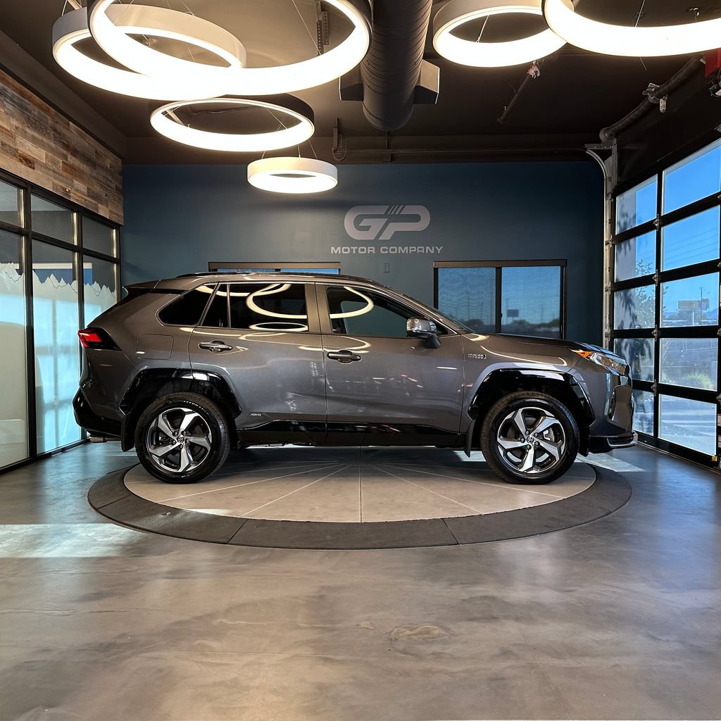 Used 2021 Toyota RAV4 SE w/ Weather & Moonroof Package AWD/4WD image 2