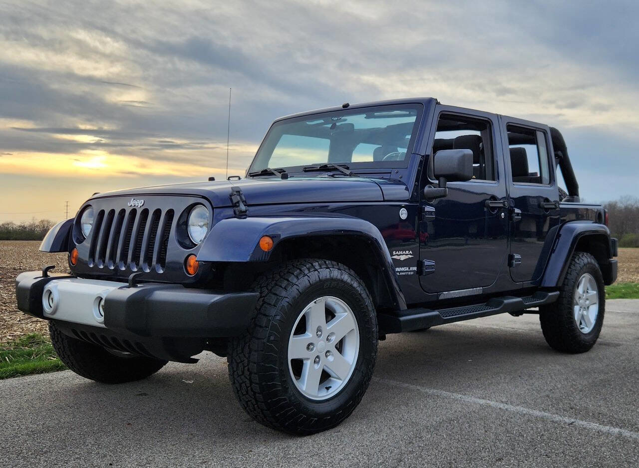 Used 2013 Jeep Wrangler Unlimited Sahara image 1