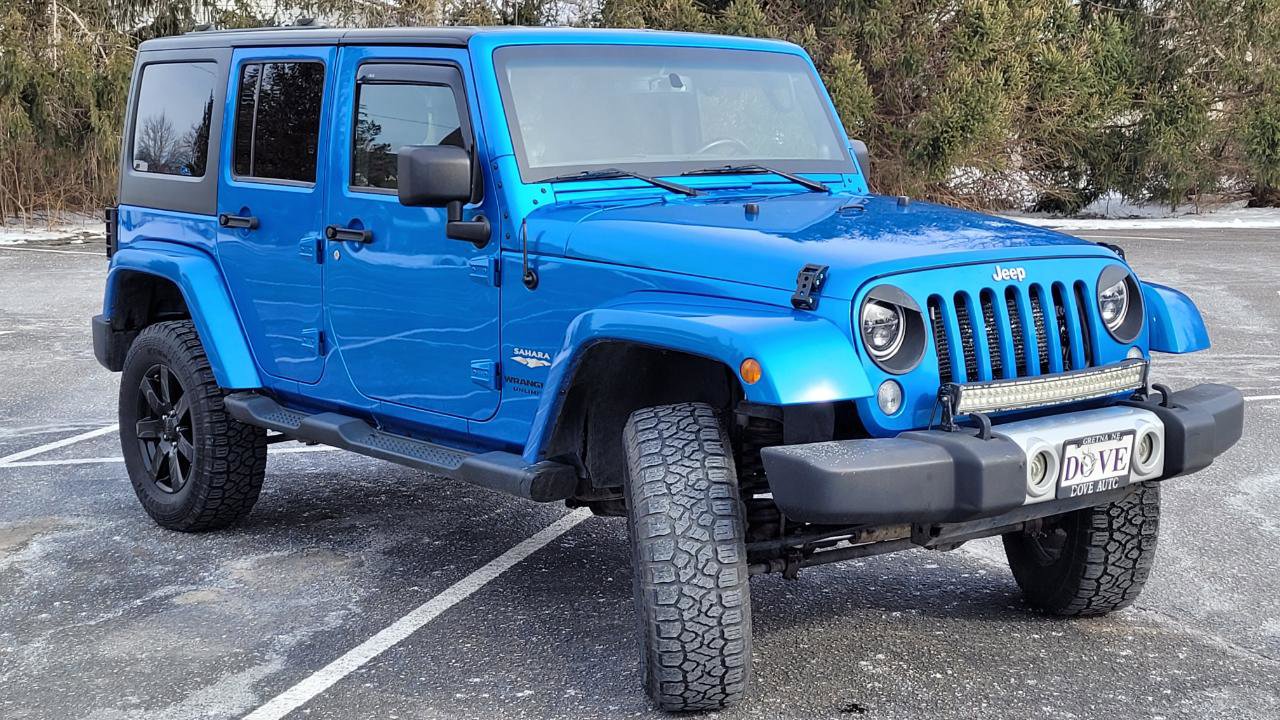 Used 2014 Jeep Wrangler Unlimited Sahara w/ Dual Top Group AWD/4WD image 9