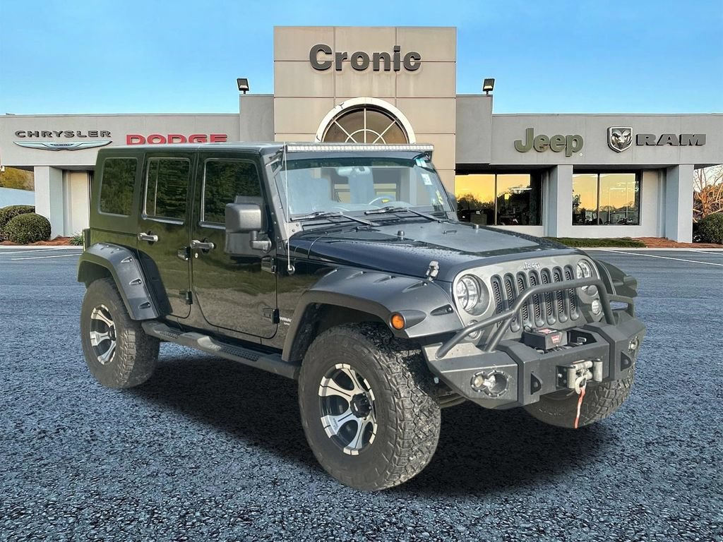 Used 2010 Jeep Wrangler Unlimited Sport AWD/4WD image 1