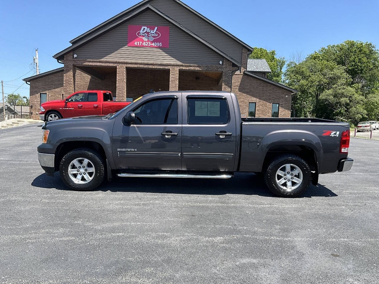 Used 2011 GMC Sierra 1500 SLE w/ Power Tech Package AWD/4WD image 2