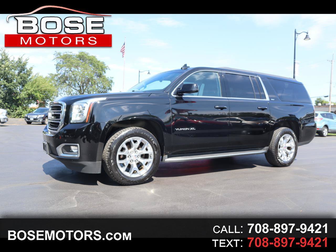 Used 2016 GMC Yukon XL SLT w/ Open Road Package AWD/4WD image 1