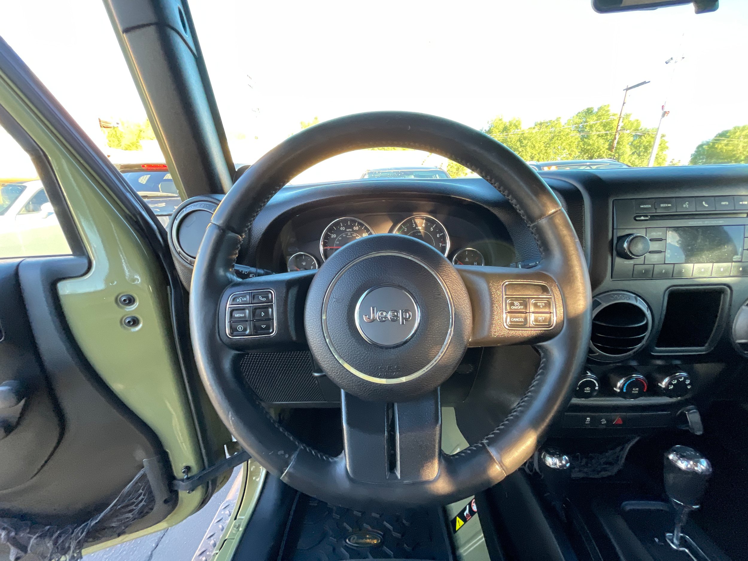 Used 2013 Jeep Wrangler Unlimited Sport w/ Mopar Black Appearance Group AWD/4WD image 12