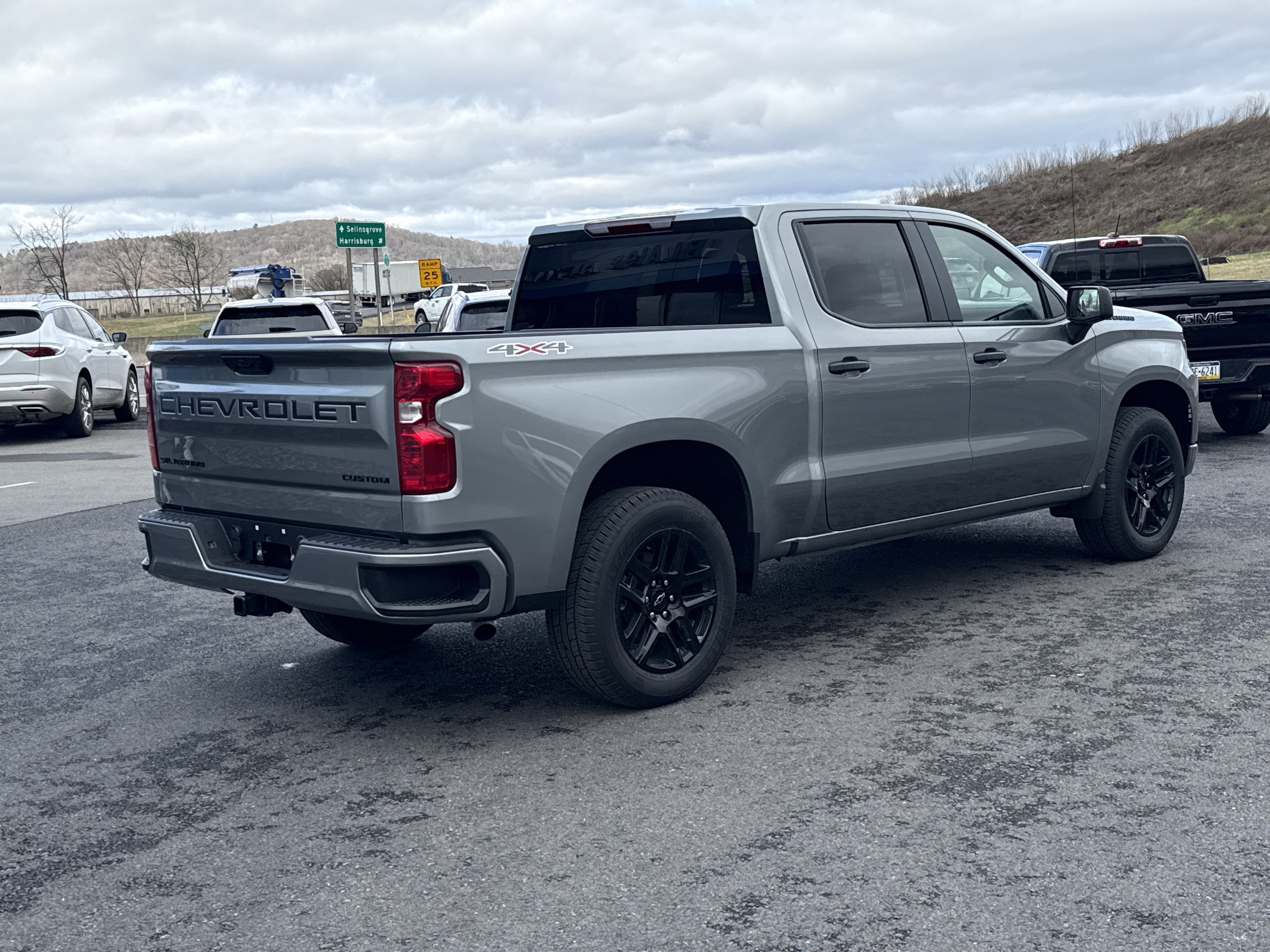 New 2026 Chevrolet Silverado 1500 Custom w/ LPO, Dark Essentials Package AWD/4WD video 3