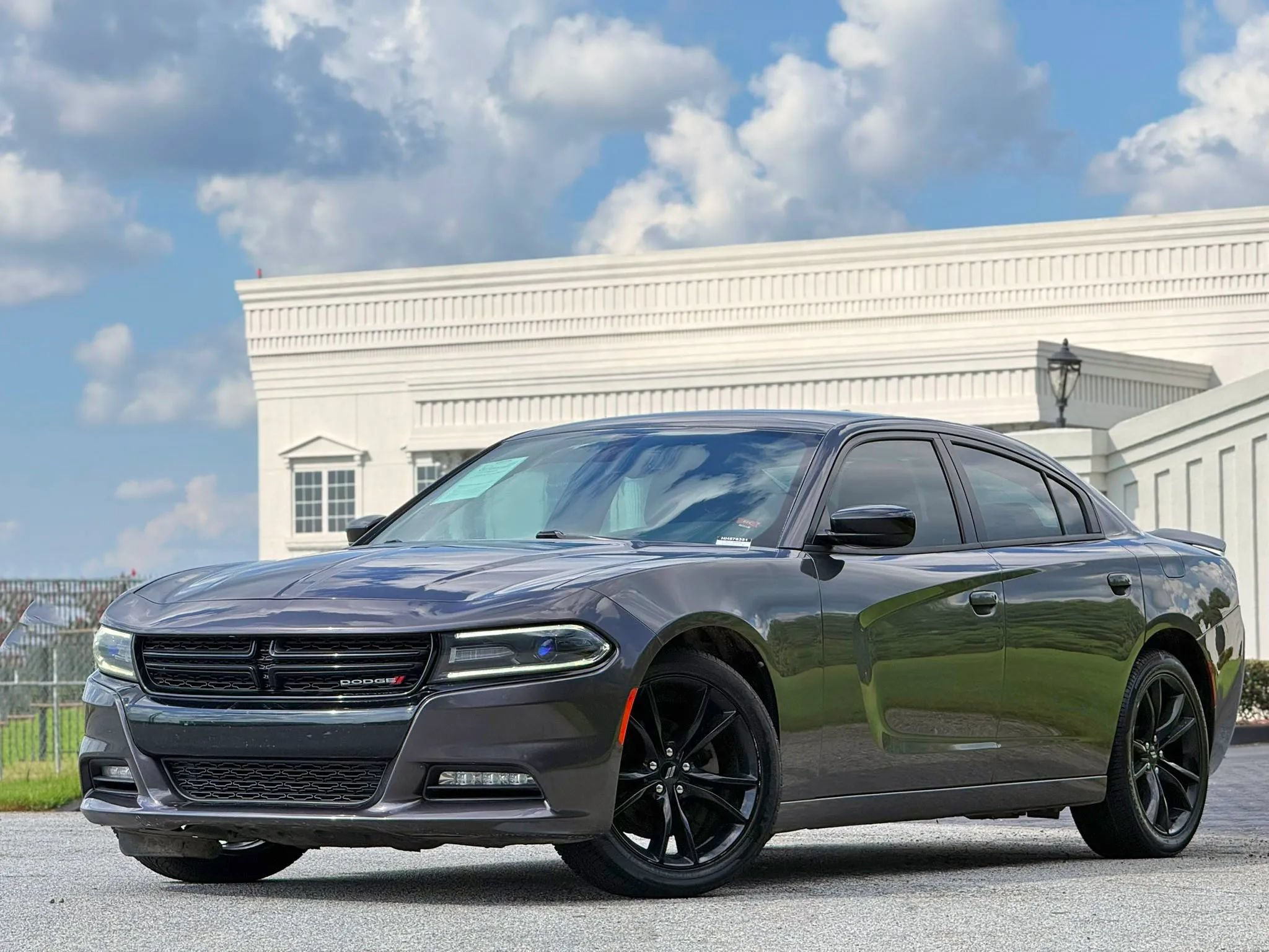 Used 2017 Dodge Charger SXT w/ Blacktop Package RWD image 1
