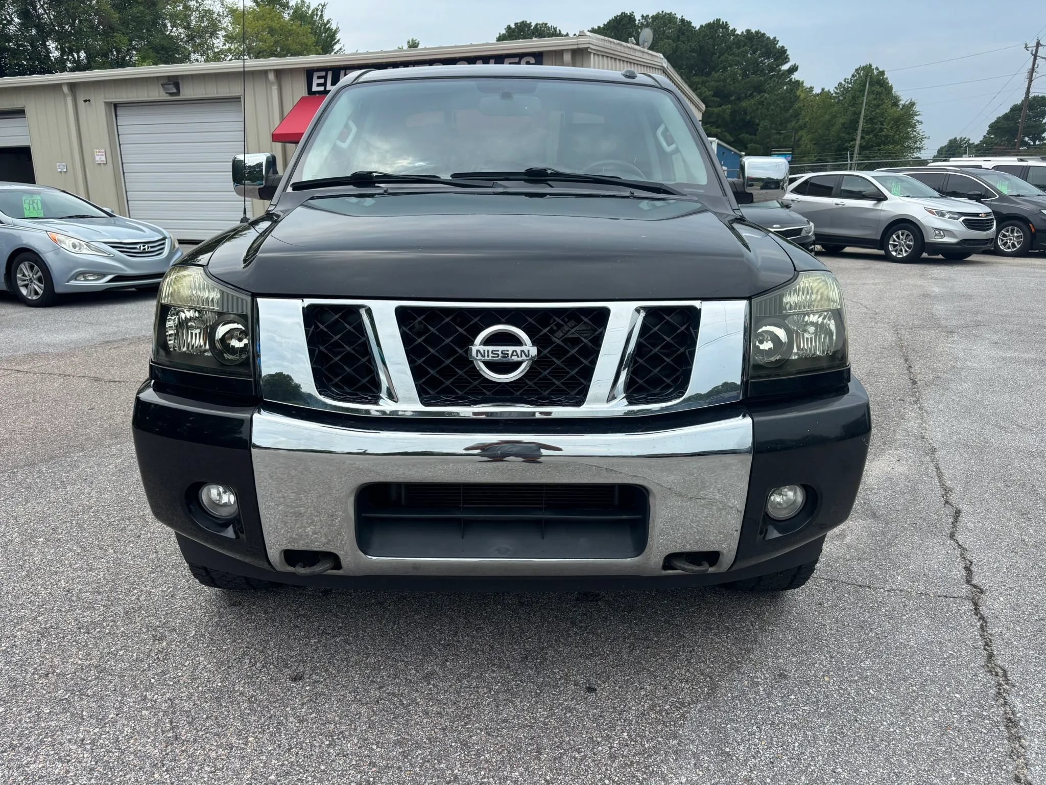 Used 2015 Nissan Titan SL w/ SL Heavy Metal Package AWD/4WD image 4