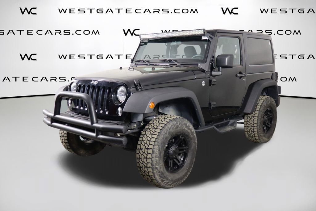Used 2015 Jeep Wrangler Sport image 1