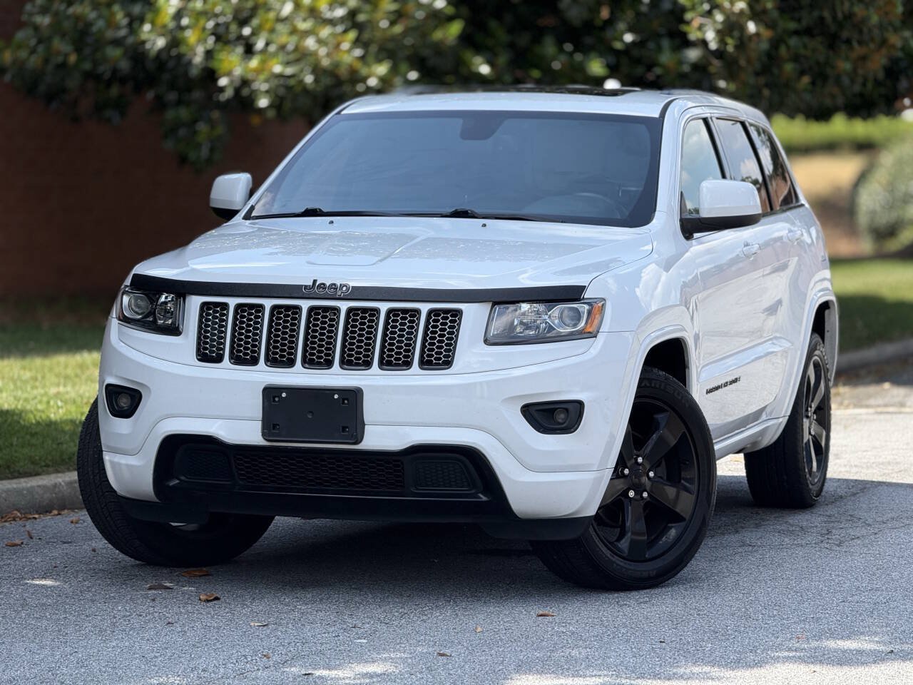 Used 2015 Jeep Grand Cherokee Altitude AWD/4WD image 1