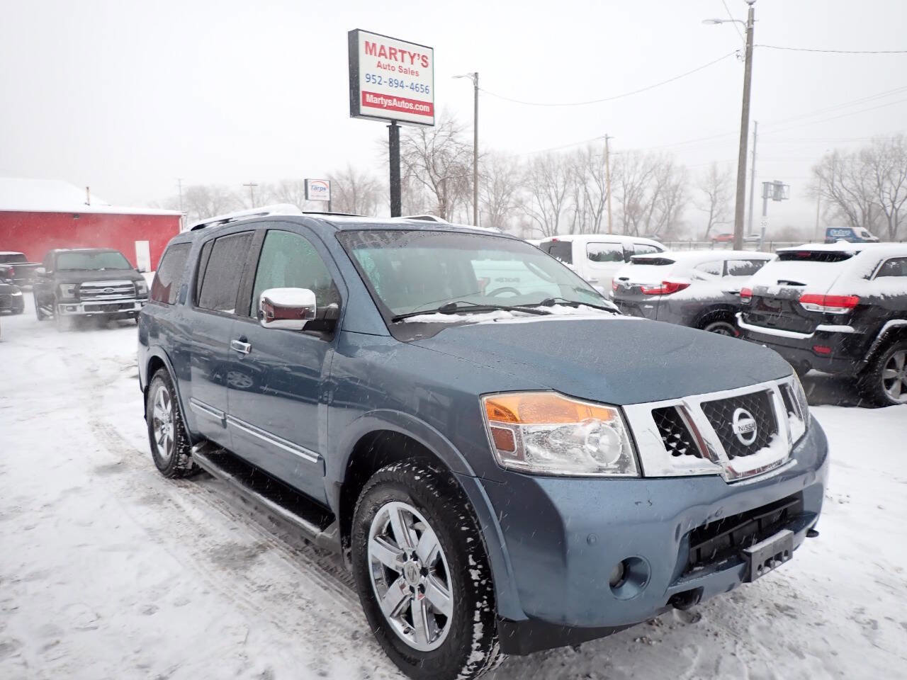 Used 2011 Nissan Armada Platinum w/ 2nd Row Captain Seat Pkg