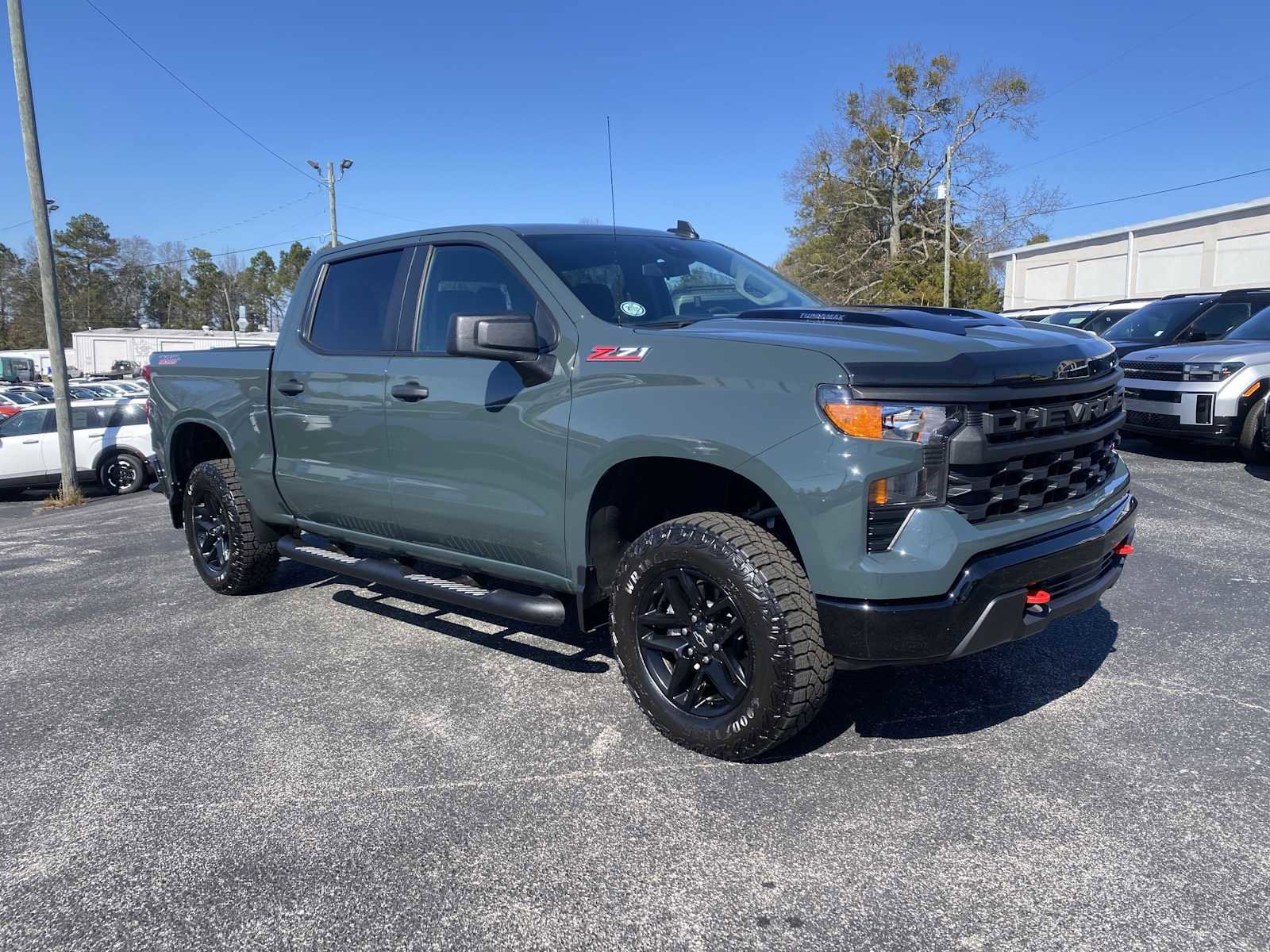 Used 2025 Chevrolet Silverado 1500 Custom Trail Boss AWD/4WD image 1