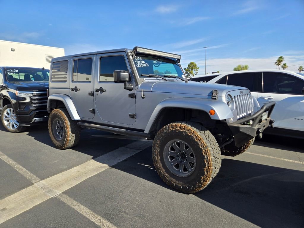 Used 2015 Jeep Wrangler Unlimited Sahara w/ Mopar Chrome Edition Group AWD/4WD image 1