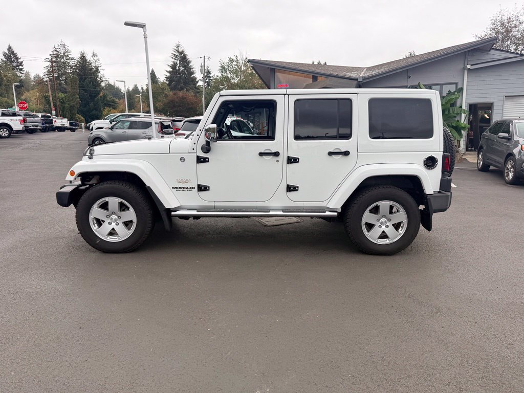 Used 2012 Jeep Wrangler Unlimited Sahara w/ Dual Top Group AWD/4WD image 2