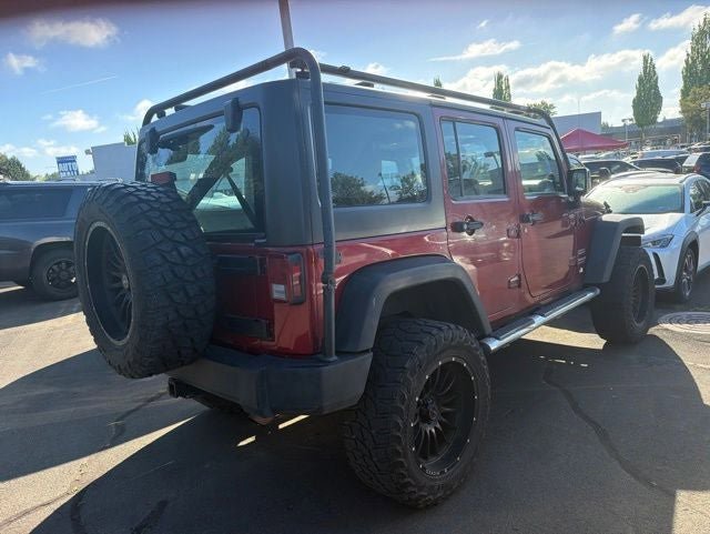Used 2012 Jeep Wrangler Unlimited Sport w/ Mopar Chrome Edition Group AWD/4WD image 2