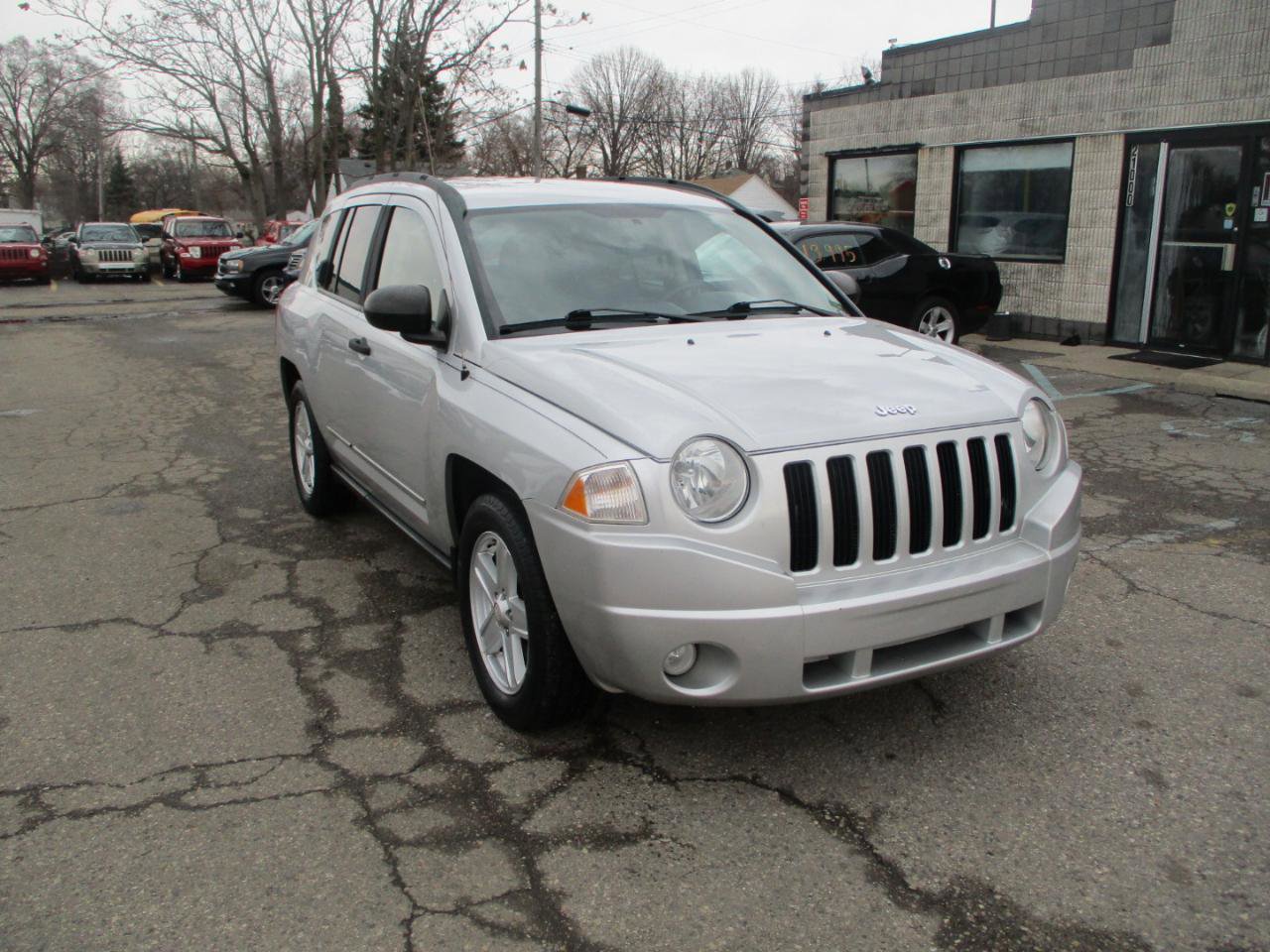 Used 2010 Jeep Compass Sport image 1