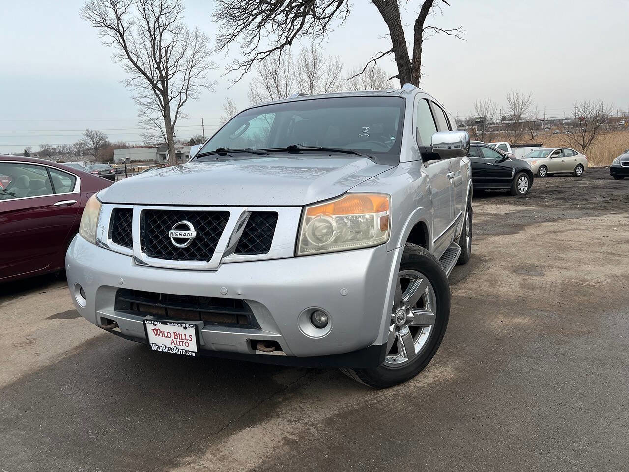 Used 2011 Nissan Armada Platinum image 1