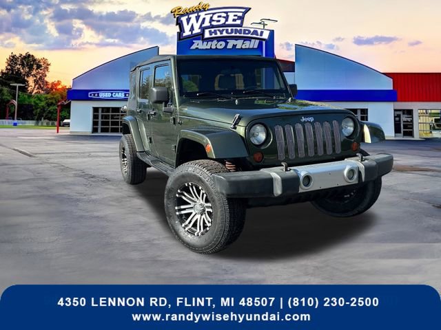 Used 2009 Jeep Wrangler Unlimited Sahara w/ Dual Top Group