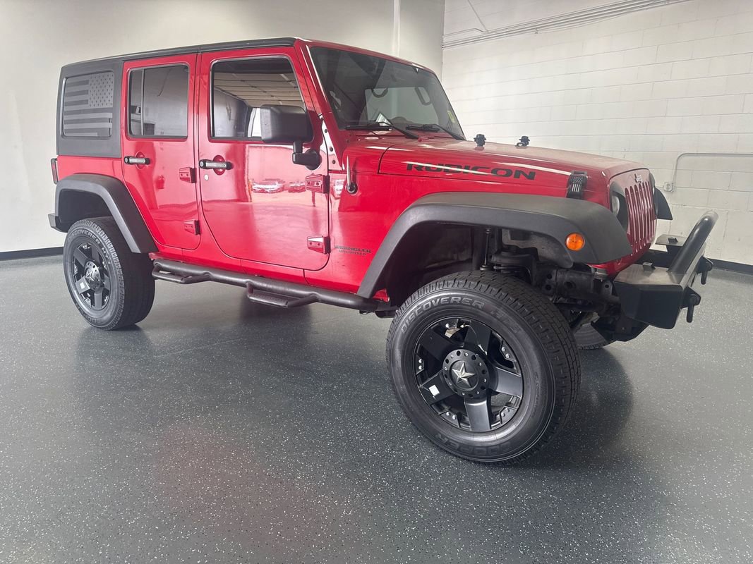 Used 2012 Jeep Wrangler Unlimited Rubicon w/ Dual Top Group image 2