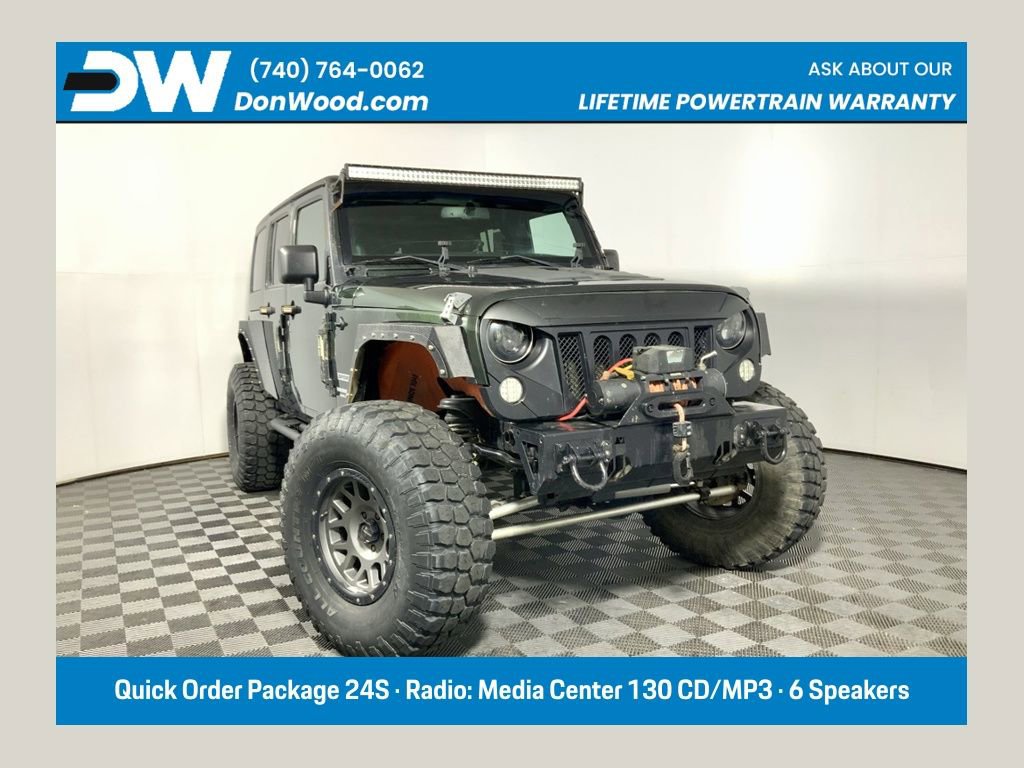 Used 2011 Jeep Wrangler Unlimited Sport